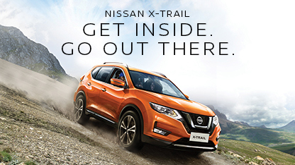 Orange Nissan X-Trail